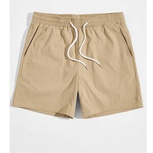 Men’s solid tan drawstring waist shorts size Medium worn once!
